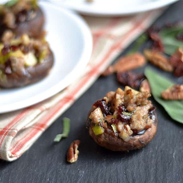 Sausage and cranberry stuffed mushroom on a table