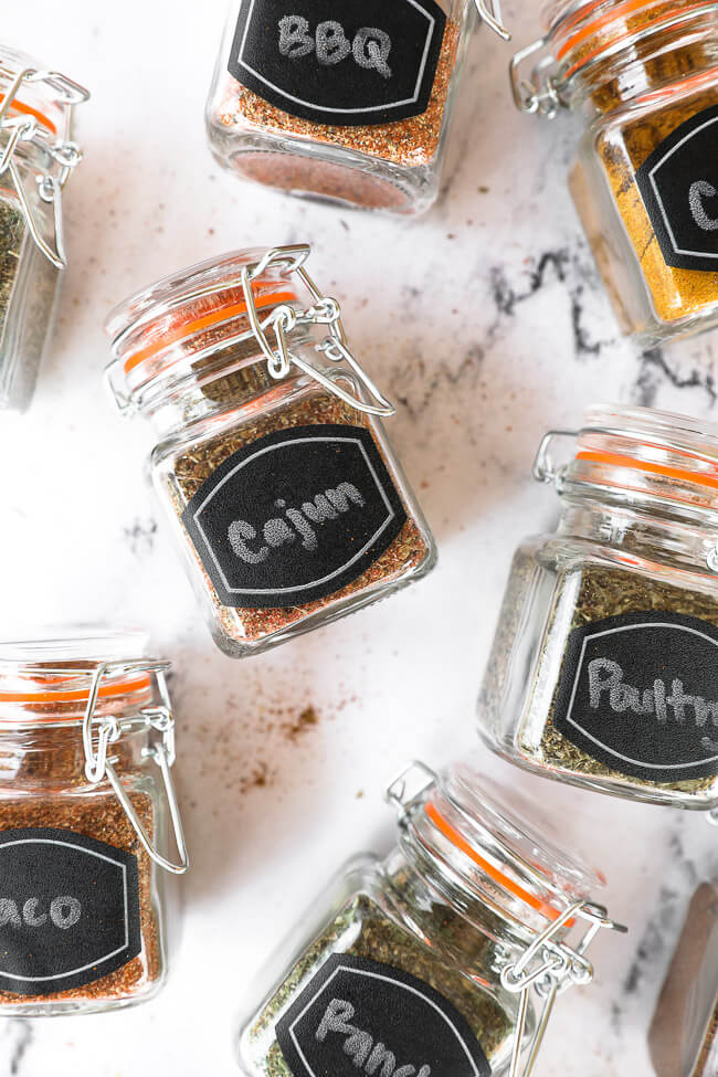 spice blends in jars laying on a countertop