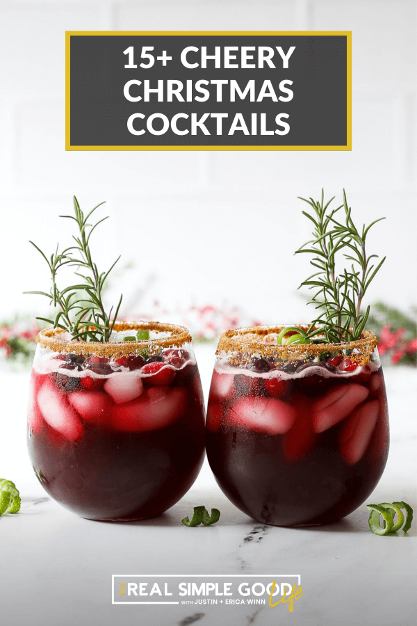 Straight on shot of two glasses with a red christmas drink and rosemary sprigs. Text overlay of 15+ cheery christmas cocktails