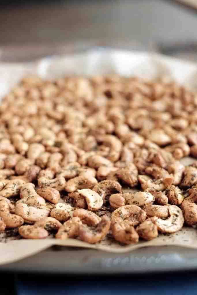 A simple snack to have on hand for a party or for a quick snack, these ranch roasted cashews are easy to make and won't last long! Paleo, clean, and easy! | realsimplegood.com