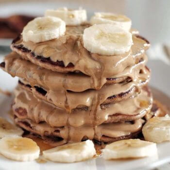 Paleo banana pancakes with nut butter and syrup