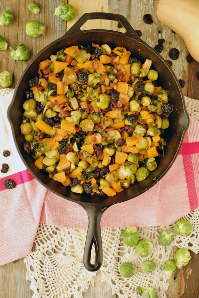 This Paleo + Whole30 roasted brussels squash side dish is a simple and flavorful dish to accompany any meal. Healthy and delicious all in one pan. Paleo + Whole30. | realsimplegood.com