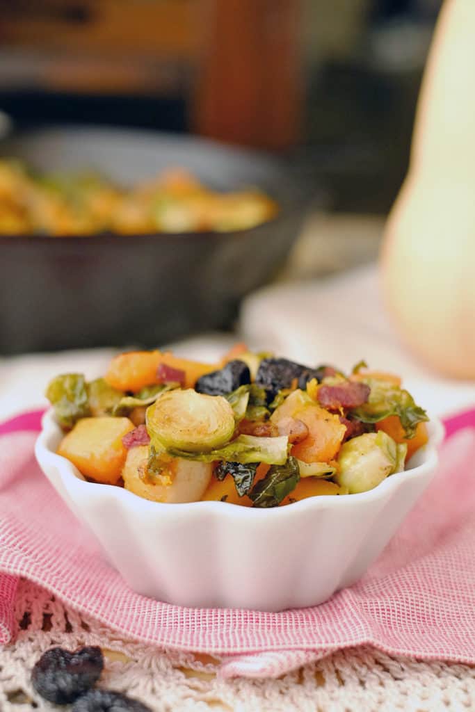 This Paleo + Whole30 roasted brussels squash side dish is a simple and flavorful dish to accompany any meal. Healthy and delicious all in one pan. Paleo + Whole30. | realsimplegood.com