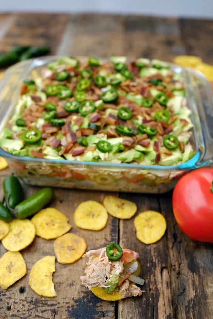 This Paleo + Whole30 seven layer dip cuts out the sour cream and cheese you’d find in a traditional seven layer dip but it still packs on the flavor. Paleo + Whole30. | realsimplegood.com