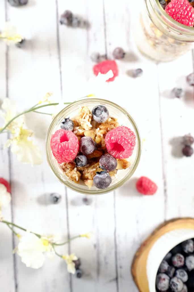 These berry granola parfaits are light and fluffy with a no-bake paleo granola and fresh berries. An easy snack to enjoy! Paleo, Gluten-Free, Dairy-Free and Refined Sugar-Free. | realsimplegood.com