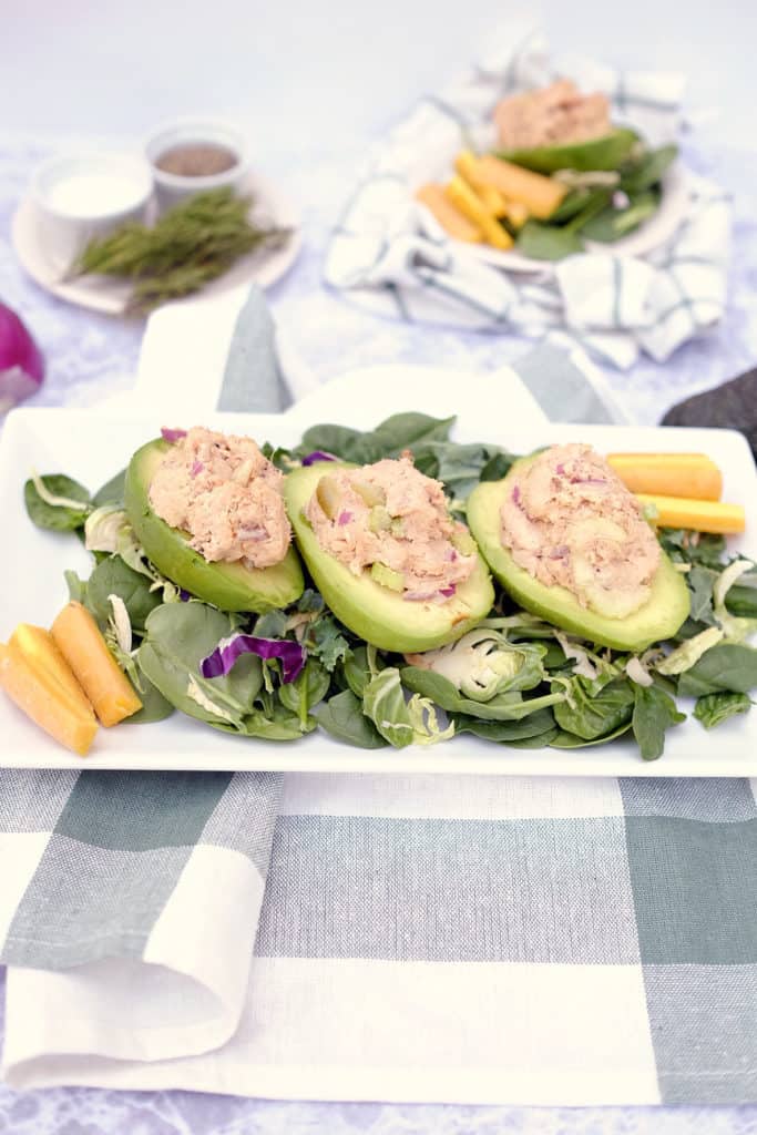 Do you struggle with lunch ideas, or are you looking for ways to up your lunch game? Here's a fresh Paleo + Whole30 idea - chicken salad stuffed avocados. Paleo, Whlole30 + Dairy-Free. | realsimplegood.com
