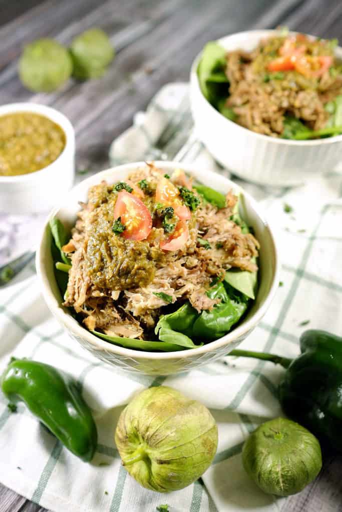 Tomatillos and chilies, garlic and cilantro blend to make the perfect sauce for tender pork in this easy Paleo + Whole30 crockpot pork chile verde recipe. Paleo + Whole30 | realsimplegood.com