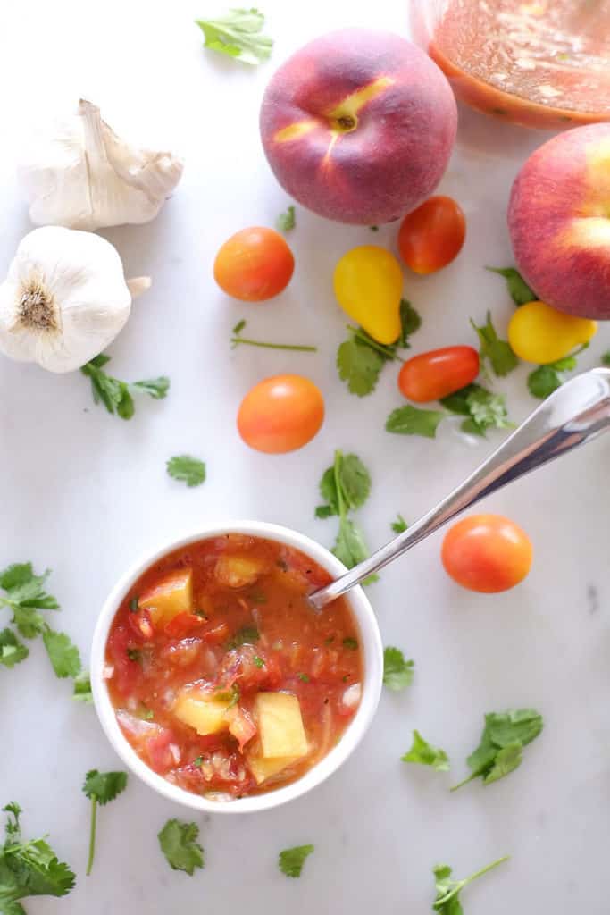 Fresh, local peaches are perfect for this summertime peach salsa. It doesn't get any better or fresher than this Paleo + Whole30 homemade salsa. Paleo + Whole30. | realsimplegood.com