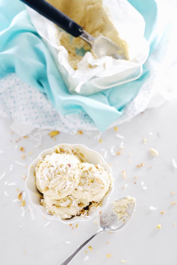 A creamy bowl of ice cream hits the spot on a long summer day. This no churn pistachio ice cream is full of nutty, slightly salty and sweet flavors. Paleo, Gluten-Free, Dairy-Free + Refined Sugar-Free. | realsimplegood.com