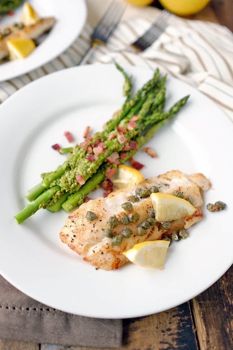 Need a speedy weeknight meal that feels like you put in more time and effort? This Paleo + Whole30 pan fried cod with pesto bacon asparagus is exactly that! Paleo + Whole30. | realsimplegood.com
