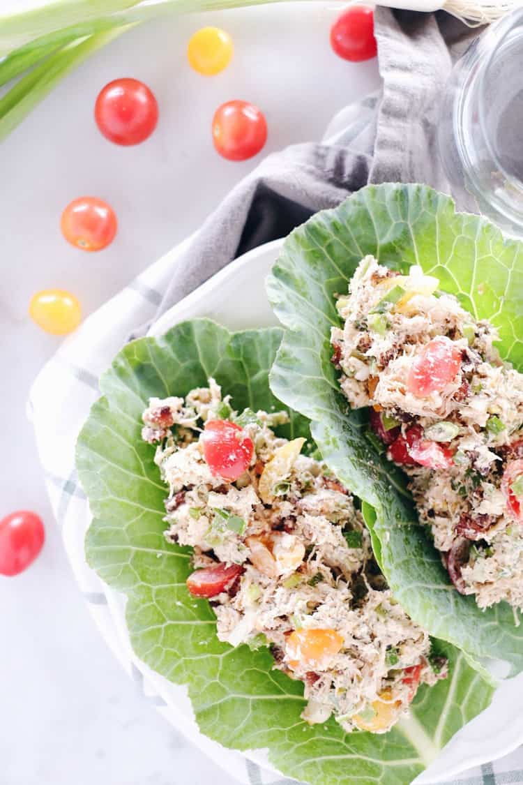 We've got all the flavors of a BLT wrapped up in this Paleo + Whole30 BLT chicken salad! We love to eat it in lettuce shells or as an easy snack + dip. Paleo, Whole30, Gluten-Free + Dairy-Free. | realsimplegood.com