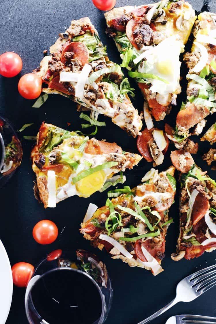 We love pizza and eating breakfast for dinner, so this breakfast pizza is pretty much destiny. Seriously, are breakfast and pizza not your favorite things? Loaded with sausage, pepperoni, mushrooms, onion, spinach, and gooey eggs. Paleo, Gluten-Free, Refined Sugar-Free + Dairy-Free. | realsimplegood.com