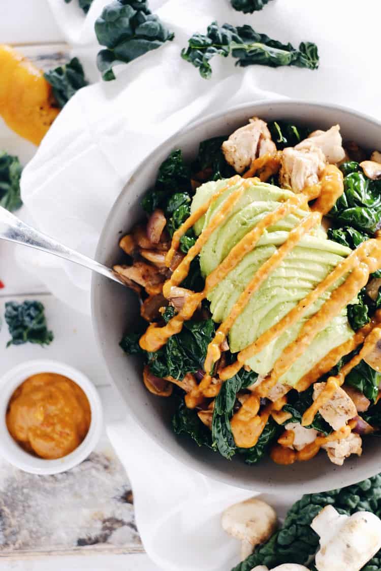 This paleo chicken bowl has the most delicious roasted pepper sauce. Clean and Whole30 with only eight ingredients, you can prepare it in under 30 minutes. Paleo, Whole30, Gluten-Free + Dairy-Free. | realsimplegood.com