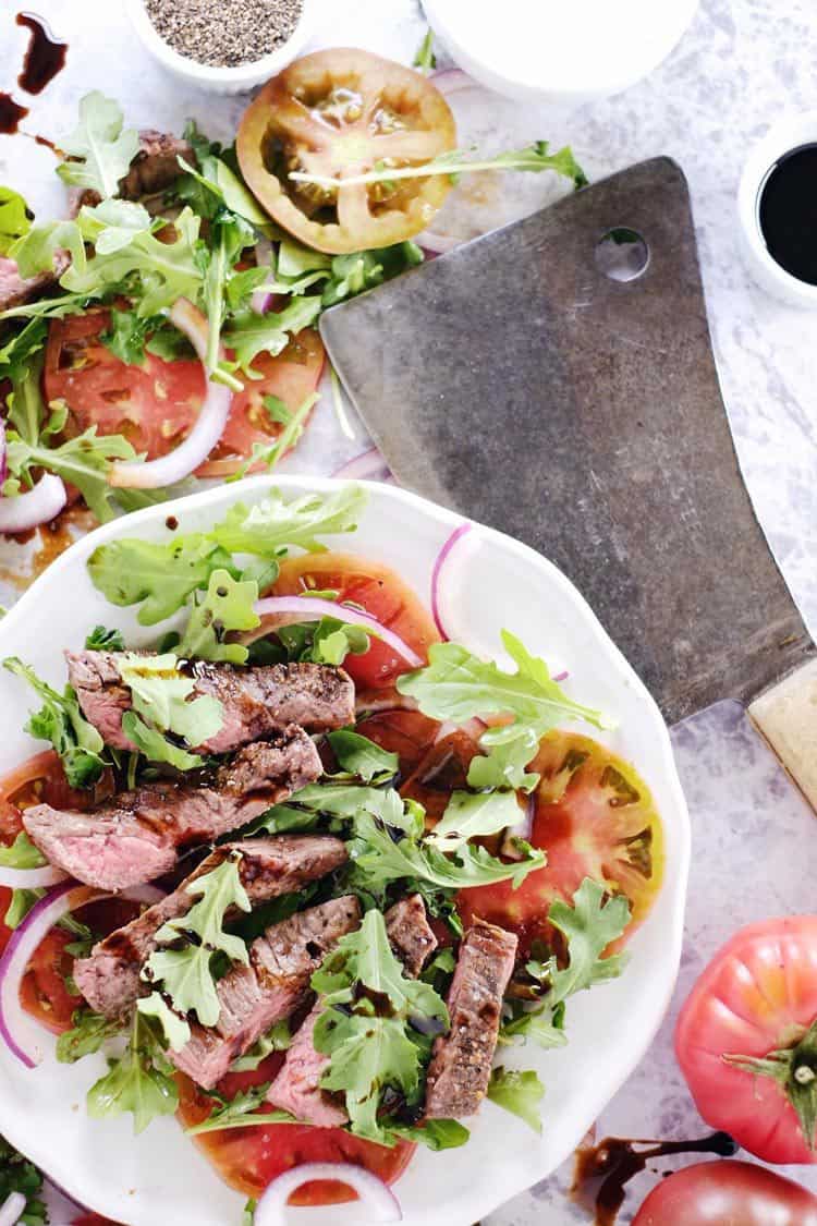 We love this simple steak salad because there are just a handful of ingredients, nothing flashy or obscure. A simple and delicious Paleo + Whole30 dish! Paleo, Whole30, Gluten-Free, + Dairy-Free. | realsimplegood.com