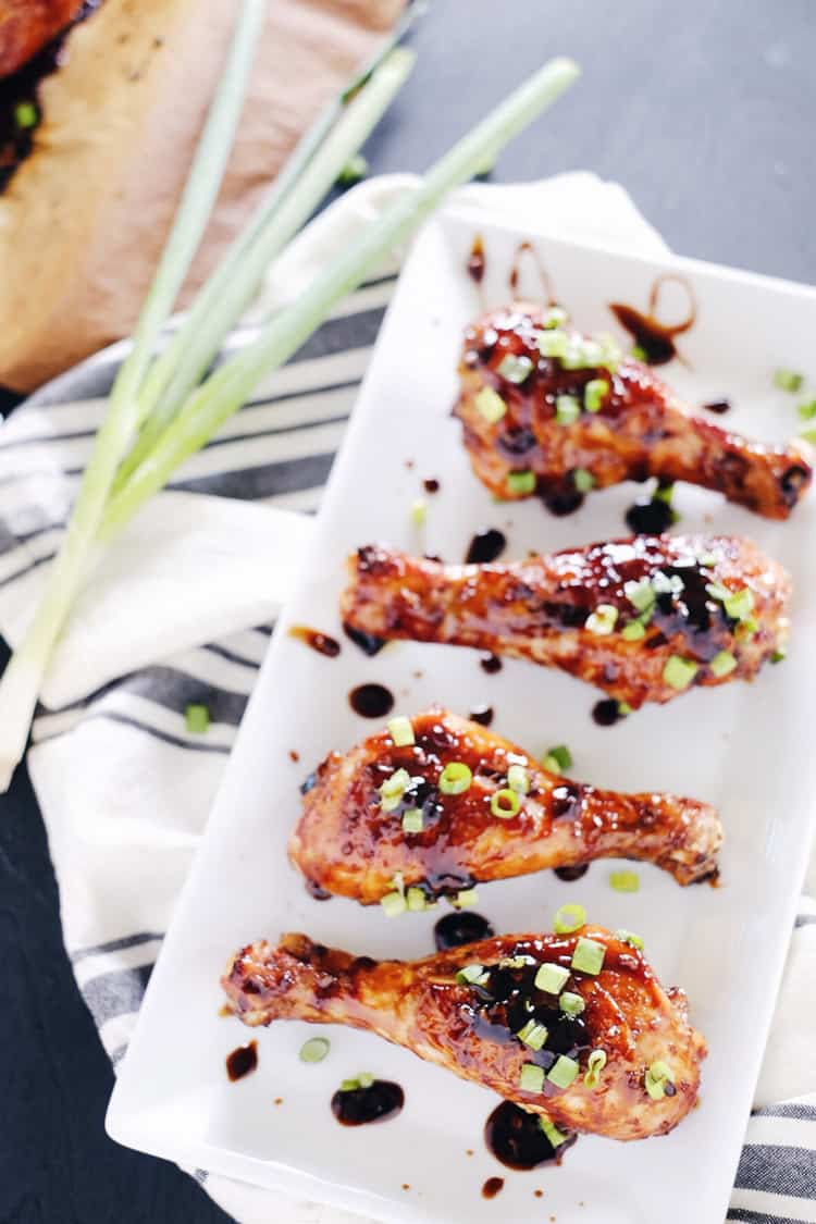 Make a pan of these balsamic glazed chicken drumsticks. You won't be able to help but lick the tasty goodness right off your fingers. You will love the combo of balsamic, coconut aminos, ginger and garlic. Paleo + Gluten-Free. | realsimplegood.com