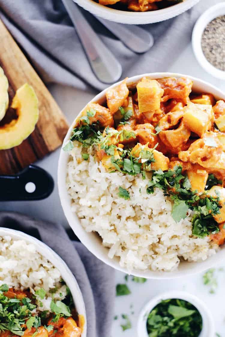 This Paleo + Whole30 red curry squash chicken bowl is so delicious, cozy and comforting. Quick and easy this fall favorite only takes 25 minutes to cook. Paleo, Whole30, Gluten-Free + Dairy-Free. | realsimplegood.com