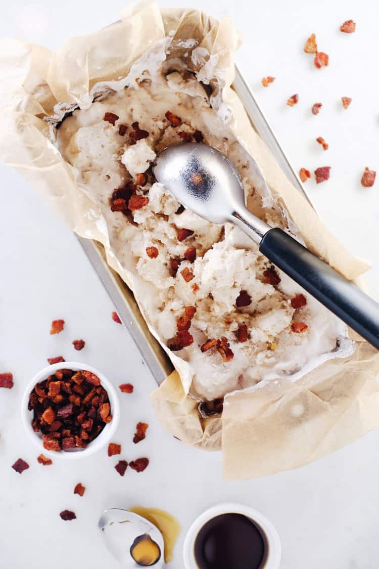 This bacon topped date ice cream is like breakfast met dessert. The crumbles of bacon on top with a little drizzle of maple syrup make it absolutely unreal. Paleo, Gluten-Free, Dairy-Free + Refined Sugar-Free. | realsimplegood.com