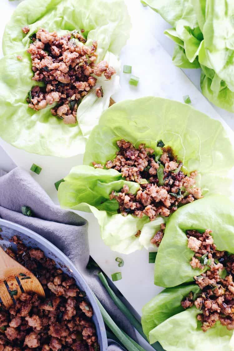 These pork lettuce wraps are tasty and quick to make, which is the best combo! Only 15 minutes and seven ingredients, an easy Paleo + Whole30 meal! Paleo, Whole30, Gluten-Free + Soy-Free. | realsimplegood.com