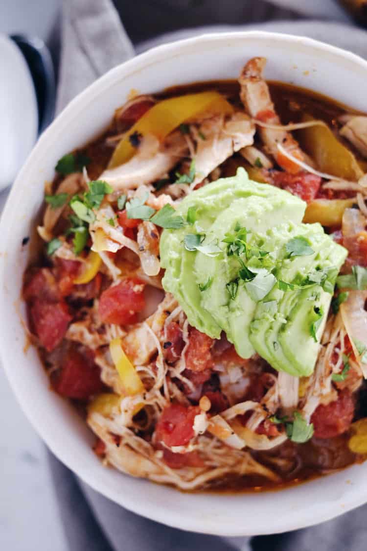 Crockpot Chicken Enchilada Soup overhead close up single bowl