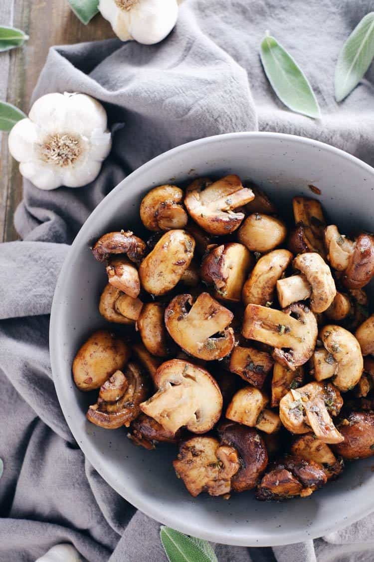 Looking for an easy and delicious side dish!?! Check out these garlic and sage brown butter mushrooms! They are extra tasty and go great with any protein! Paleo + Gluten-Free. | realsimplegood.com