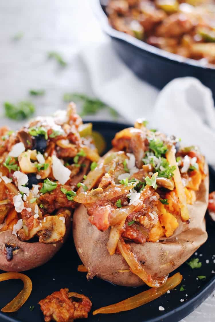 These pizza stuffed sweet potatoes are an easy way to get all the pizza flavors you crave in a Paleo + Whole30 compliant recipe! The dairy is completely optional. Paleo, Whole30 +Gluten-Free. | realsimplegood.com