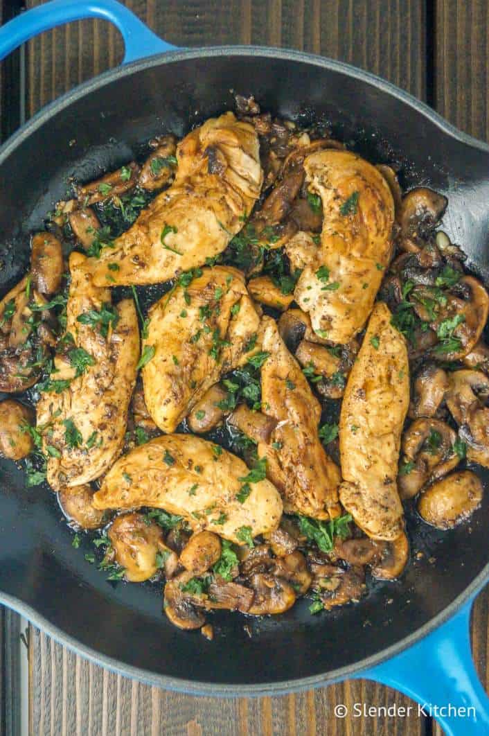 Balsamic chicken with mushrooms and thyme in skillet