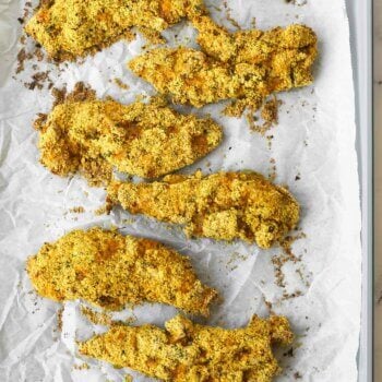 Baked gluten free chicken tenders on a sheet pan