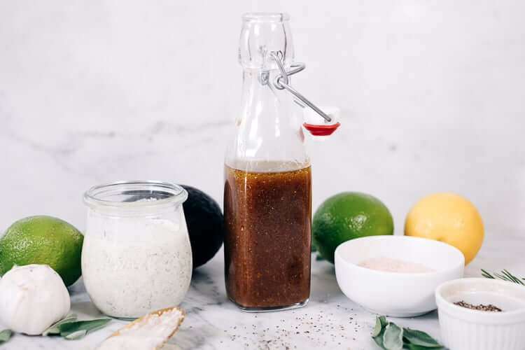 8 Healthy Salad Dressing Recipes that you can use on any salad! Make your own healthy, delicious salad dressing at home. Recipes include ranch, chili lime, caesar, greek, asian, italian, avocado and balsamic. Quick and easy healthy recipes with Paleo + Whole30 options. #Paleo #Whole30 #dressing
