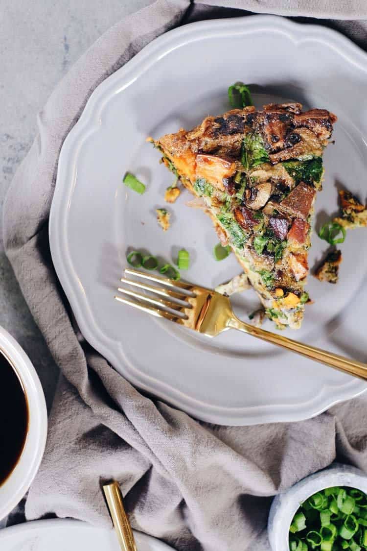 This Paleo and Whole30 bacon sweet potato frittata is a savory-sweet dish that is perfect for making over the weekend to have in the fridge during the week. Paleo, Whole30 + Dairy-Free | realsimplegood.com