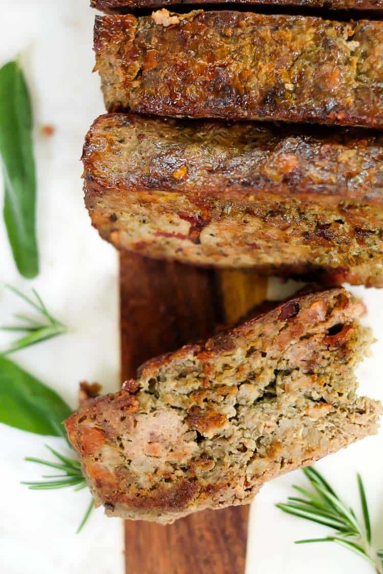 Breakfast meatloaf with bacon horizontal overhead with meatloaf pieces