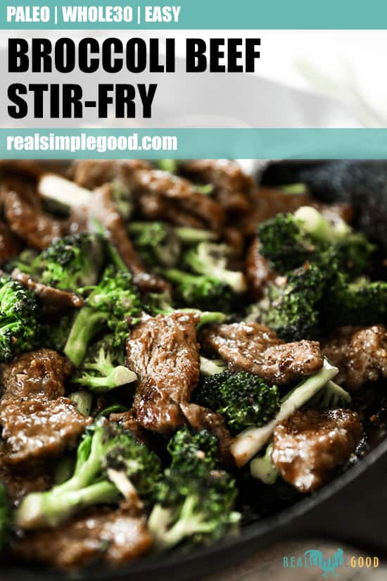 Angled shot of broccoli beef stir fry in cast iron skillet. 