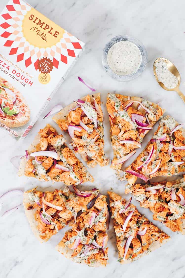 Pizza time!! Buffalo ranch chicken pizza to be specific! Enjoy this Paleo, gluten free and dairy free pizza recipe featuring Simple Mills pizza dough mix! | realsimplegood.com