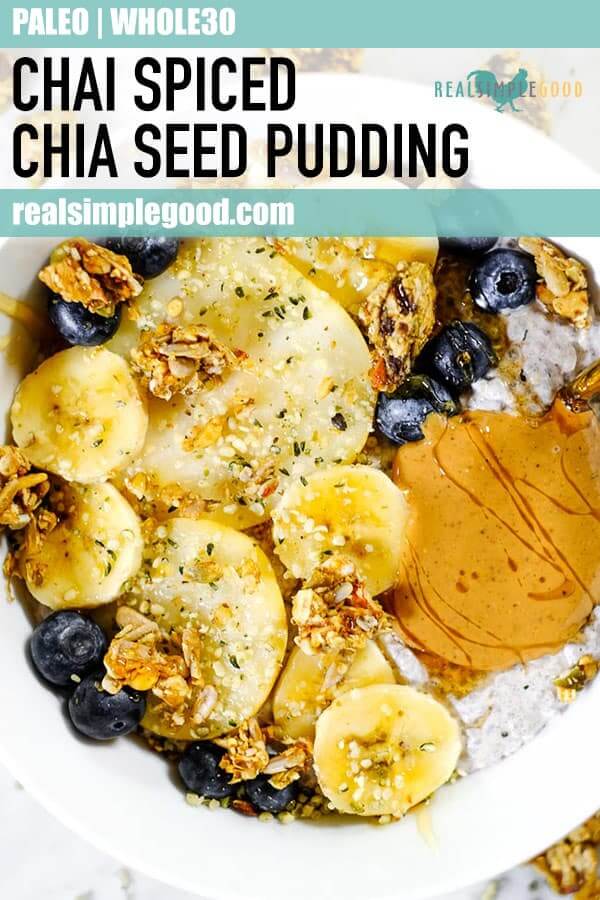 Chai spiced paleo chia seed pudding with sliced bananas, pears, blueberries, grain free granola and nut butter long pin.