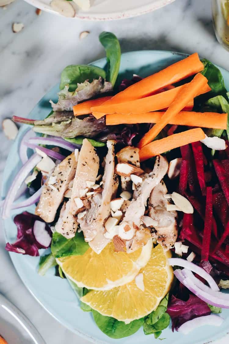 This fresh and colorful chicken and beet salad with orange is one that you will enjoy and look forward to! The dressing is amazing and Whole30 friendly, too! #paleo #whole30 #recipe | realsimplegood.com