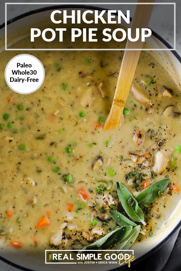 Close up vertical image of chicken pot pie soup in a large soup pot with a wooden spoon. Garnished with fresh sage, thyme and ground pepper. Text overlay at top. 
