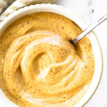 Close up overhead shot of a ramekin full of homemade chipotle aioli