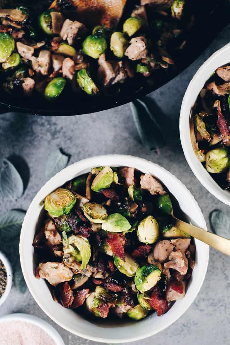 This Paleo + Whole30 Creamy Bacon Chicken and Brussels Sprouts Skillet is one that you will add to your regular rotation. It's full of dairy-free, creamy goodness that pairs so well with the salty bacon! #paleolife #whole30 #recipe #dairyfree #glutenfree | realsimplegood.com