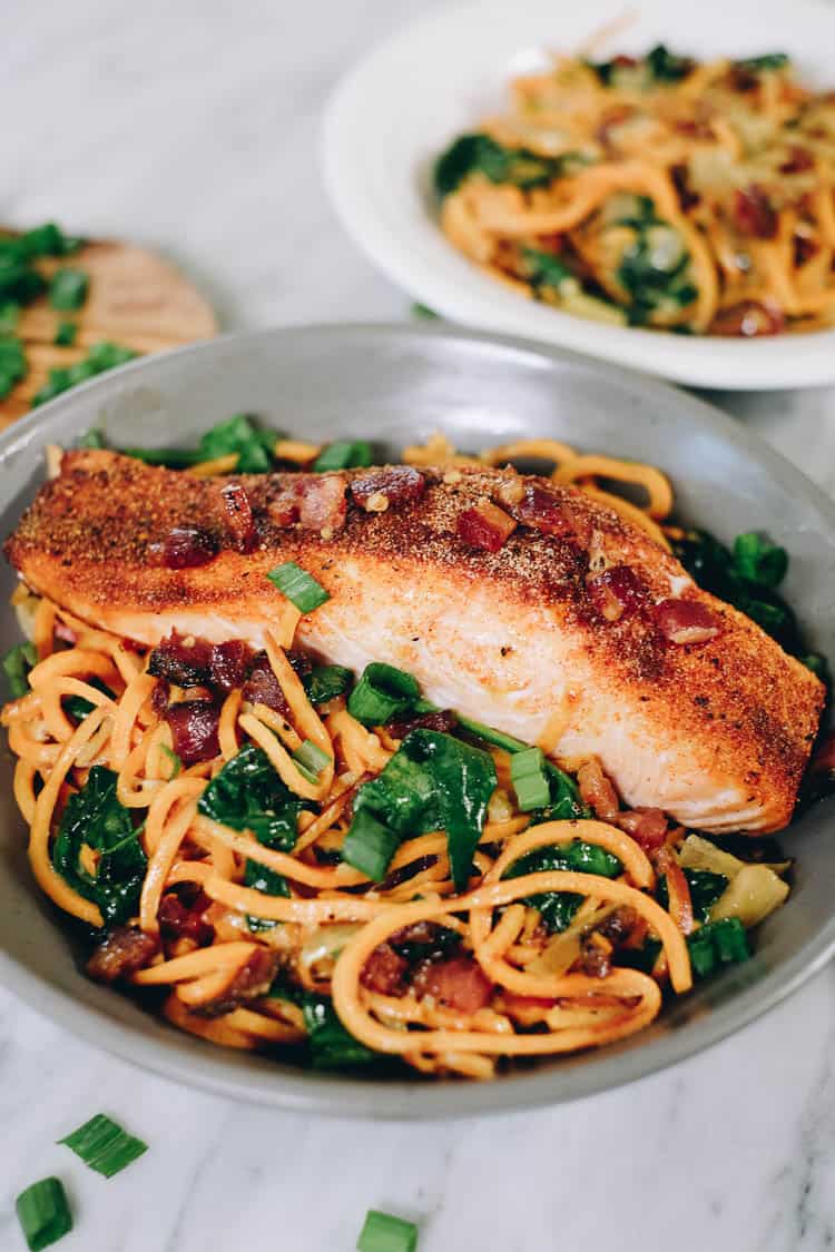 Creamy salmon sweet potato noodle bowls bowl at angle with salmon on top