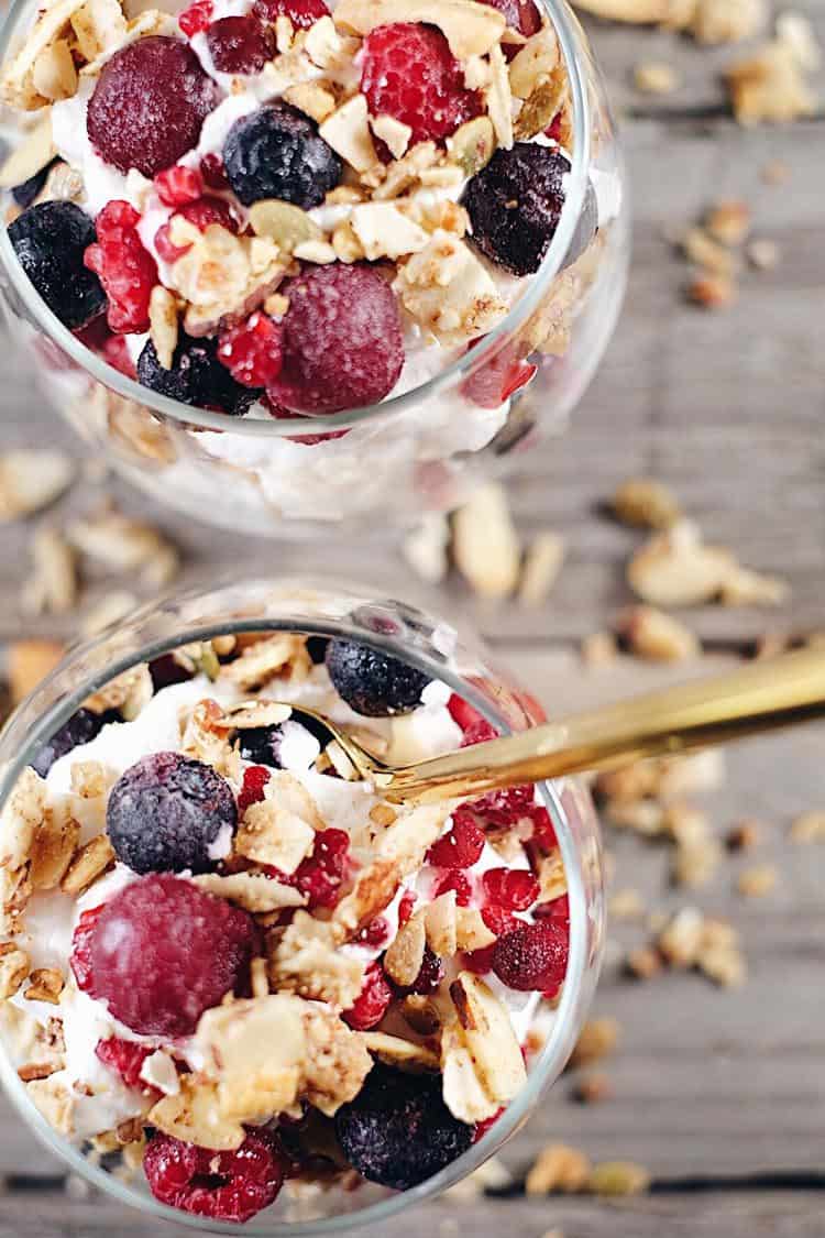 This creamy breakfast parfait is filled with healthy fats from the coconut milk, antioxidant rich berries and grain free granola to add a little crunch. Paleo, Gluten-Free, Grain-Free, Dairy-Free + Refined Sugar-Free. | realsimplegood.com