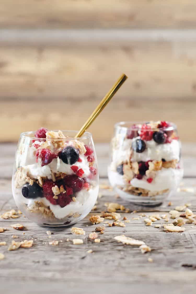 This creamy breakfast parfait is filled with healthy fats from the coconut milk, antioxidant rich berries and grain free granola to add a little crunch. Paleo, Gluten-Free, Grain-Free, Dairy-Free + Refined Sugar-Free. | realsimplegood.com