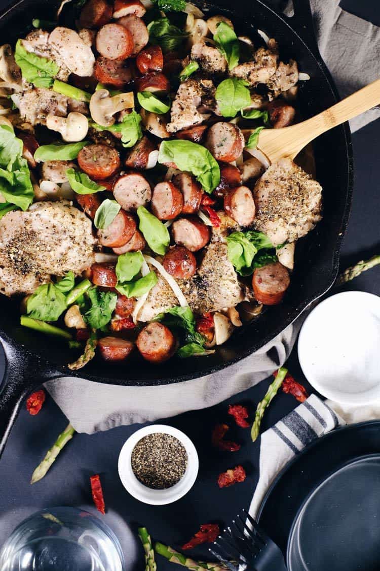 Chicken, sausage, sun dried tomatoes and veggies smothered in a velvety sauce. This creamy sun dried tomato chicken and sausage skillet is Whole30 + Paleo! Paleo, Whole30, Gluten-Free + Dairy-Free. | realsimplegood.com