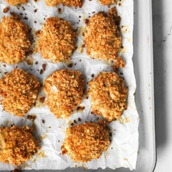 Cooked ground chicken nuggets on a sheet pan