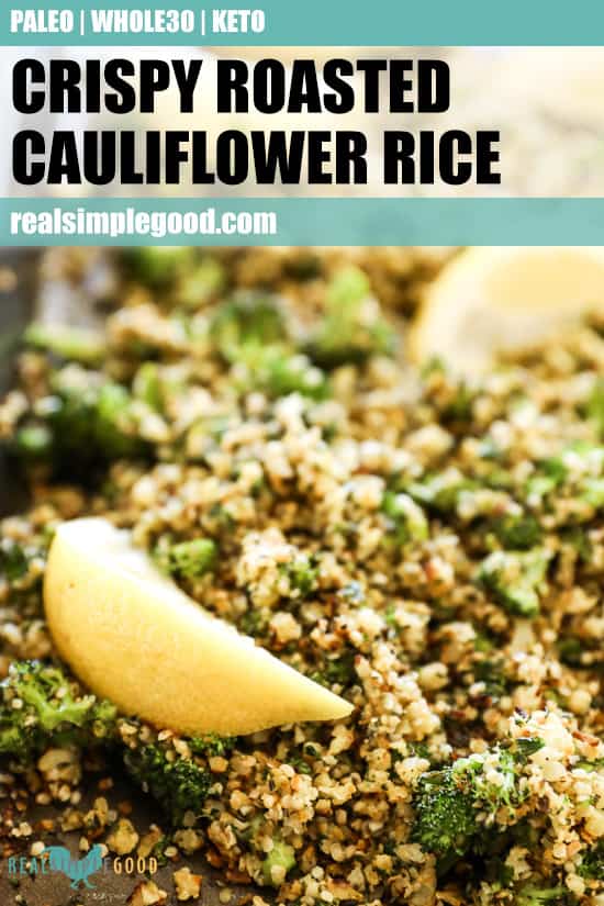 Crispy roasted cauliflower rice on a sheet pan with lemon wedges with text overlay at top of image for pinterest. 