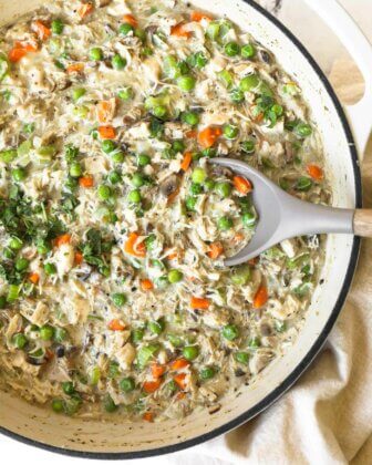 Overhead image of crustless chicken pot pie with peas, carrots and mushrooms
