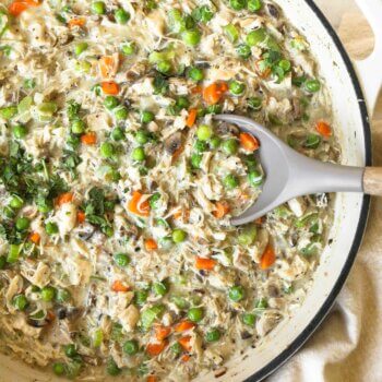 Overhead image of crustless chicken pot pie with peas, carrots and mushrooms