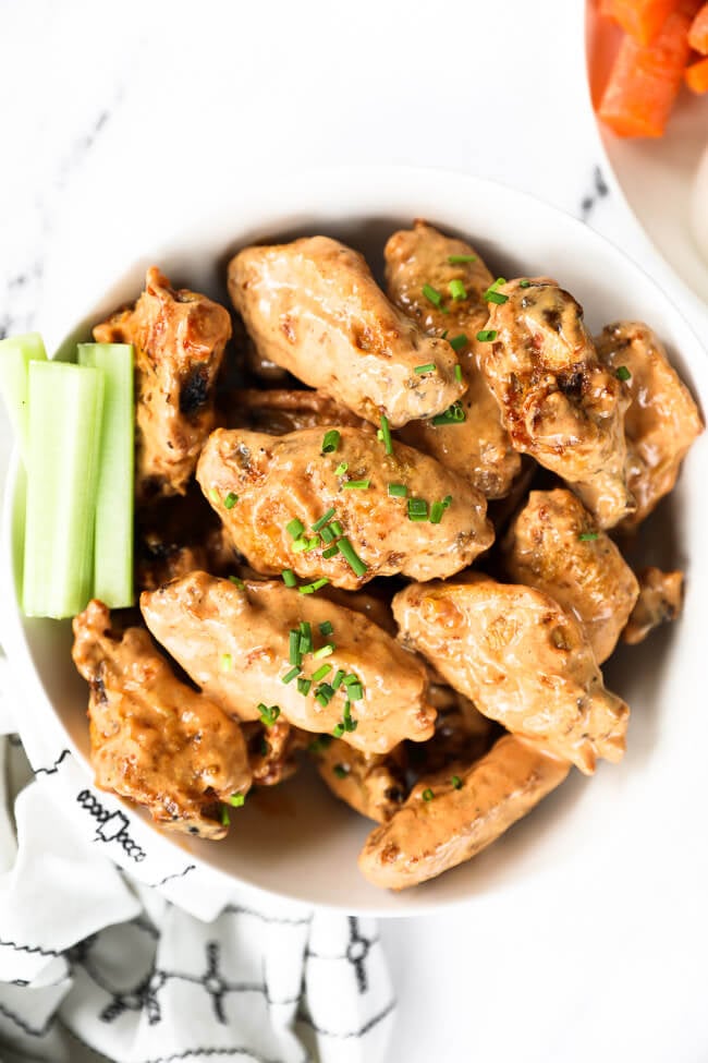 Overhead image of Buffalo Air Fryer Frozen Chicken Wings (No Thaw) tossed in creamy buffalo sauce