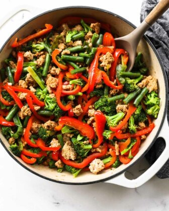Overhead image of ground turkey teriyaki stir-fry with broccoli, bell pepper and green beans