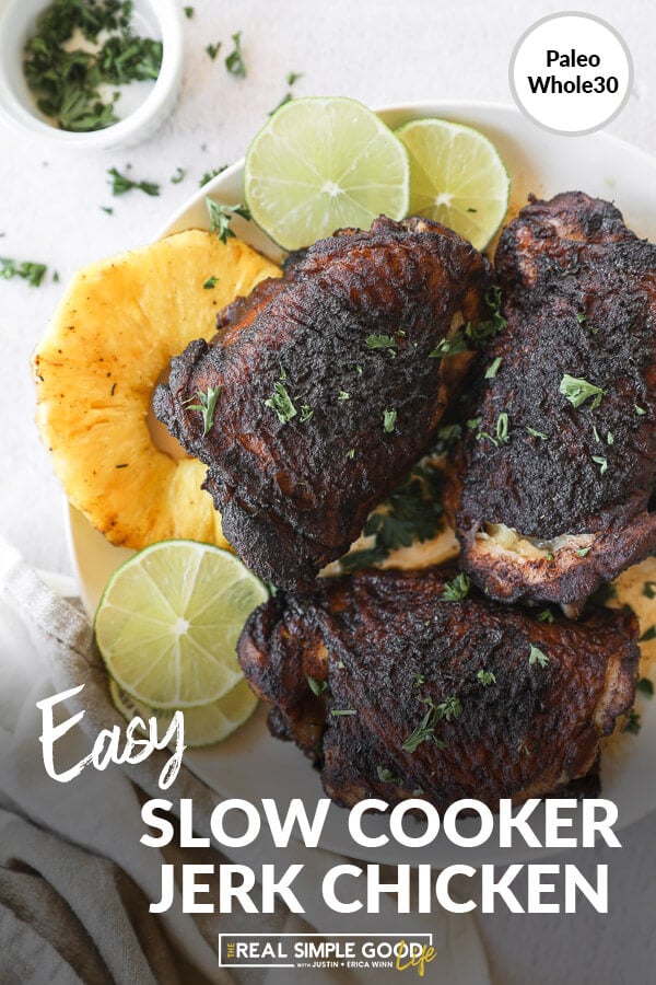 Image with text at bottom of slow cooker jerk chicken on a plate with pineapple and lime