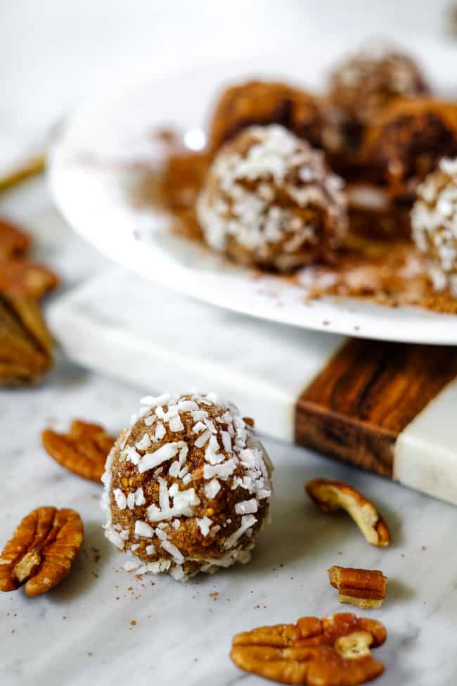 Fig and date bliss balls rolled in coconut with pecans and dried figs. 