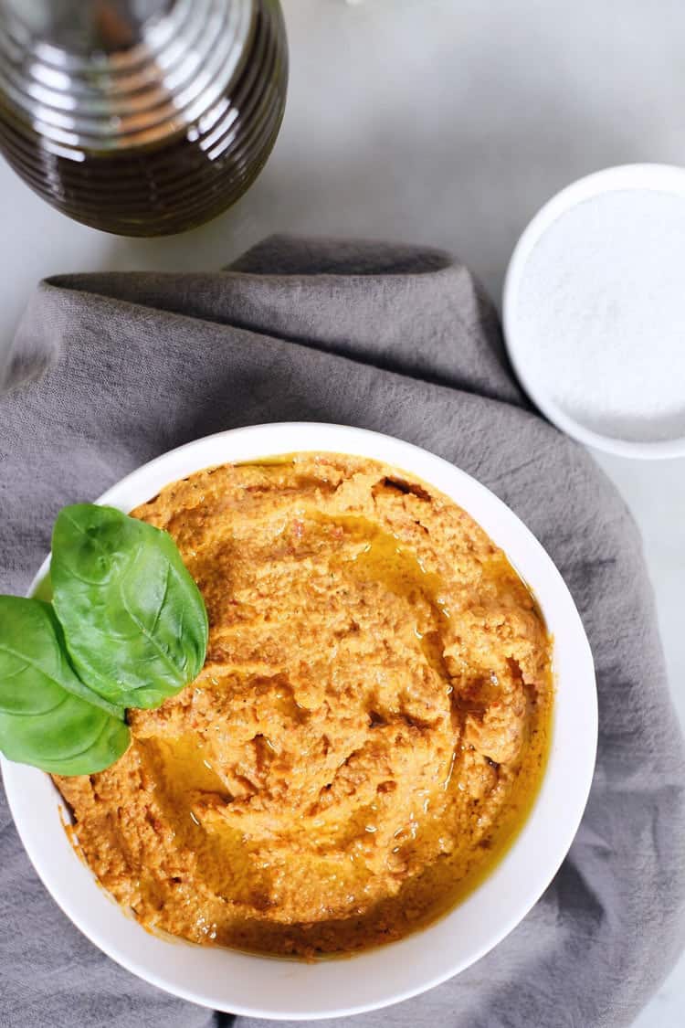 Invite some friends over, and make a batch of this garlic basil nut hummus! Get to dipping and enjoy a Paleo + Whole30 friendly version of a favorite snack! Paleo, Whole30 + Legume-Free.| realsimplegood.com